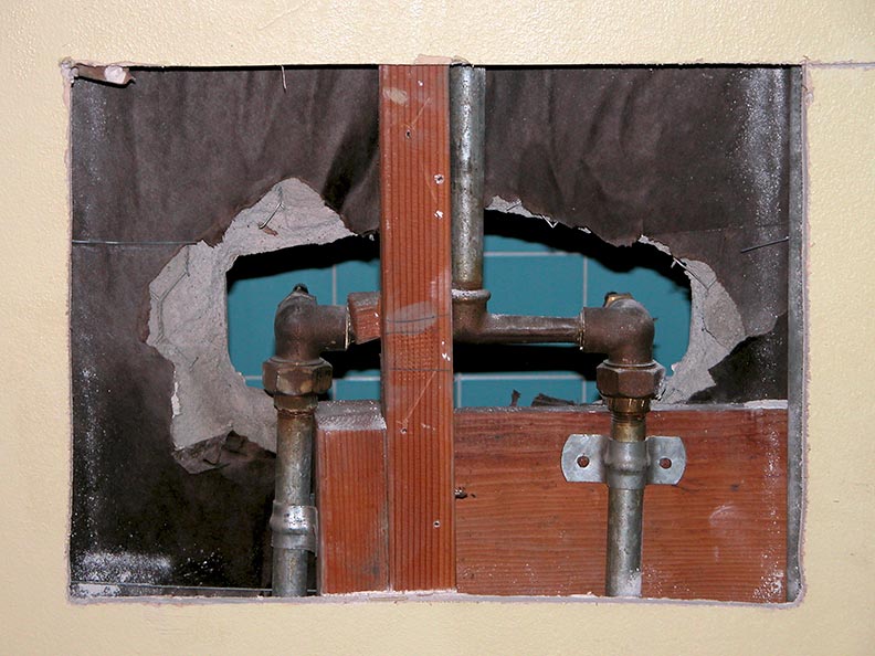 Wall cut showing old Tub Shower diverter Valve for Single Handle ADA Tub Shower mixer